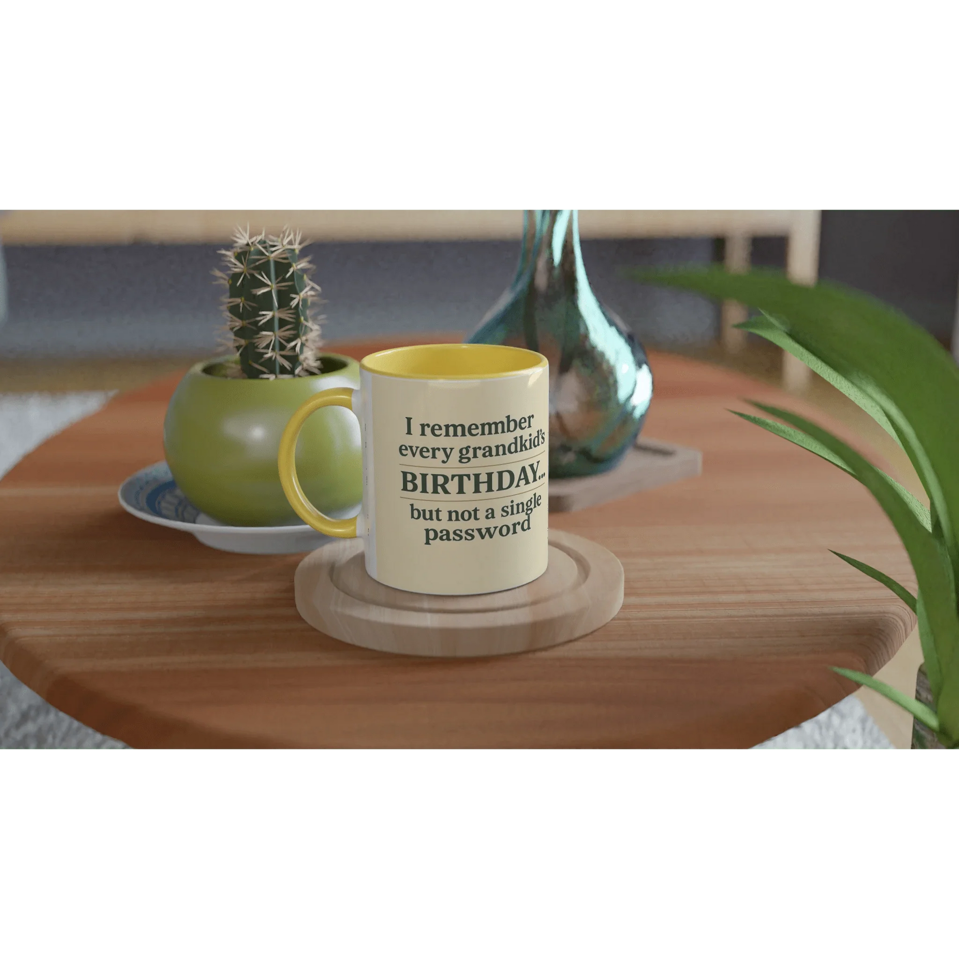 Grandkids > Passwords Mug – White 11oz ceramic with yellow interior on a wooden table.