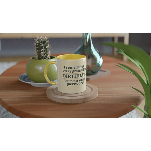 Grandkids > Passwords Mug – White 11oz ceramic with yellow interior on a wooden table.